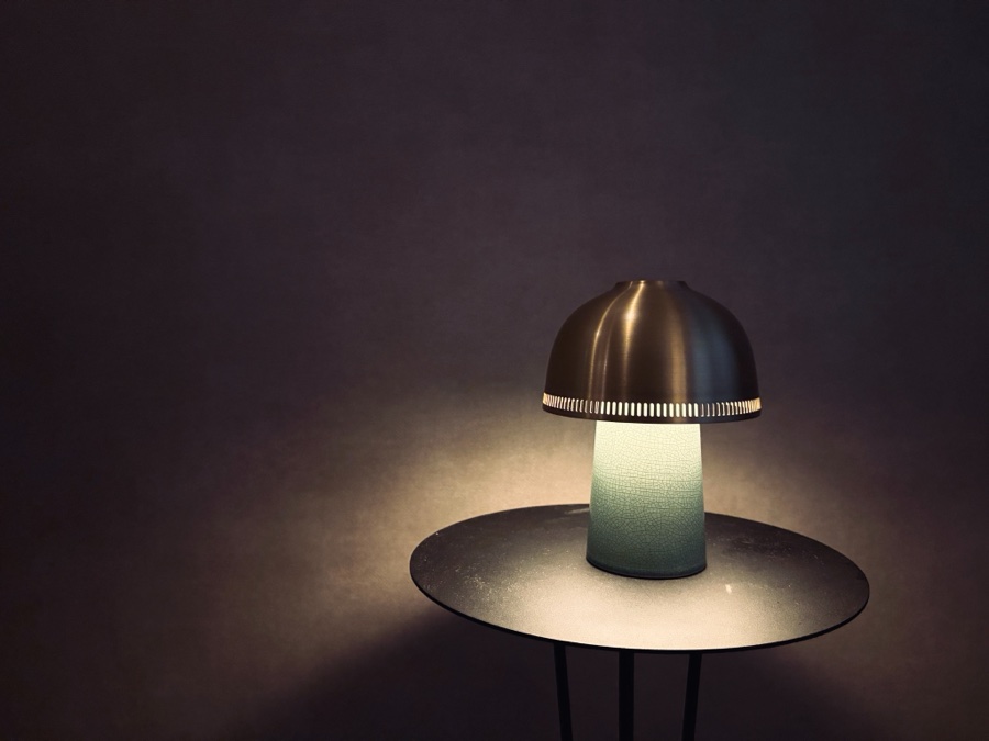 A table lamp on a round table